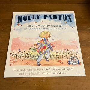 Shrink wrap, sealed , “Coat of Many Colors” by Dolly Parton - Bilingual book.